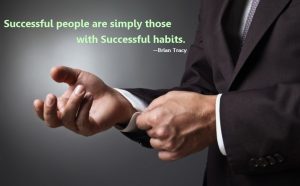 A quote about the characteristics of successful people. In the background, there is a picture of the hands of a man in a suit. 