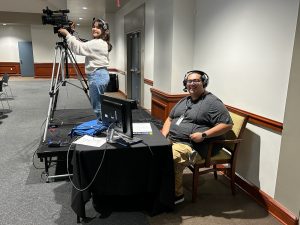 Academic Media Center student workers at a shoot at UC-Mengler Conference Room.