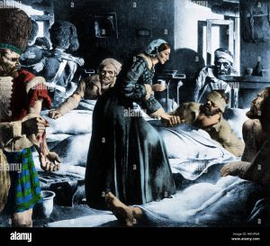 This is an image depicting Nightingale treating a patient in a military medical tent. | Courtesy of Alamy.com